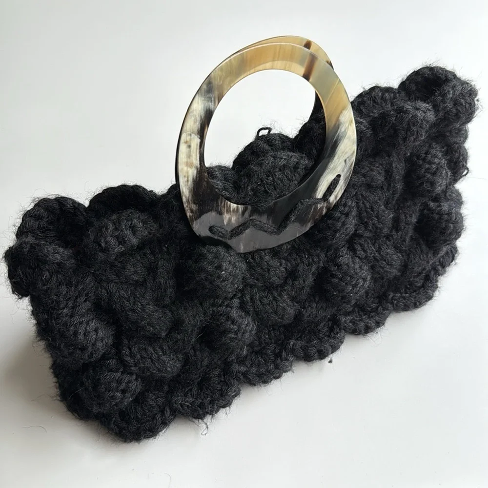 Cableknit crochet purse by Meche Correa for e bella chunky knit bag